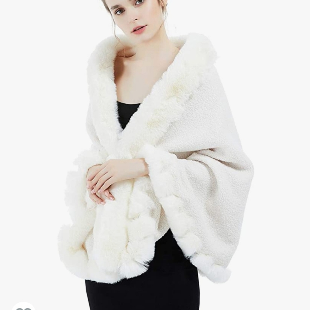 Faux fur shawl warp. New still have original packaging.